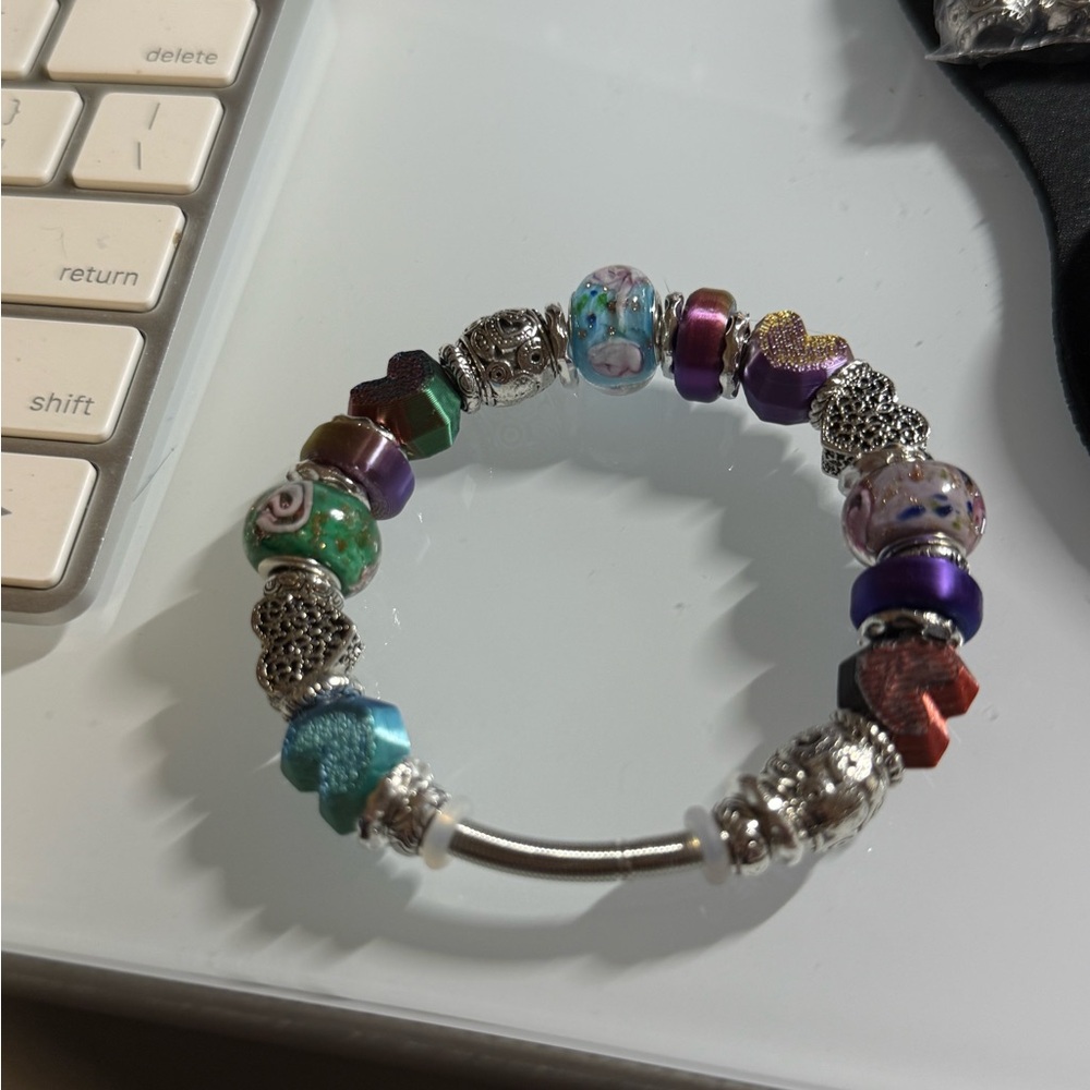 Bracelet. Made with 3d printed beads, European big hole beads and metal spacers.